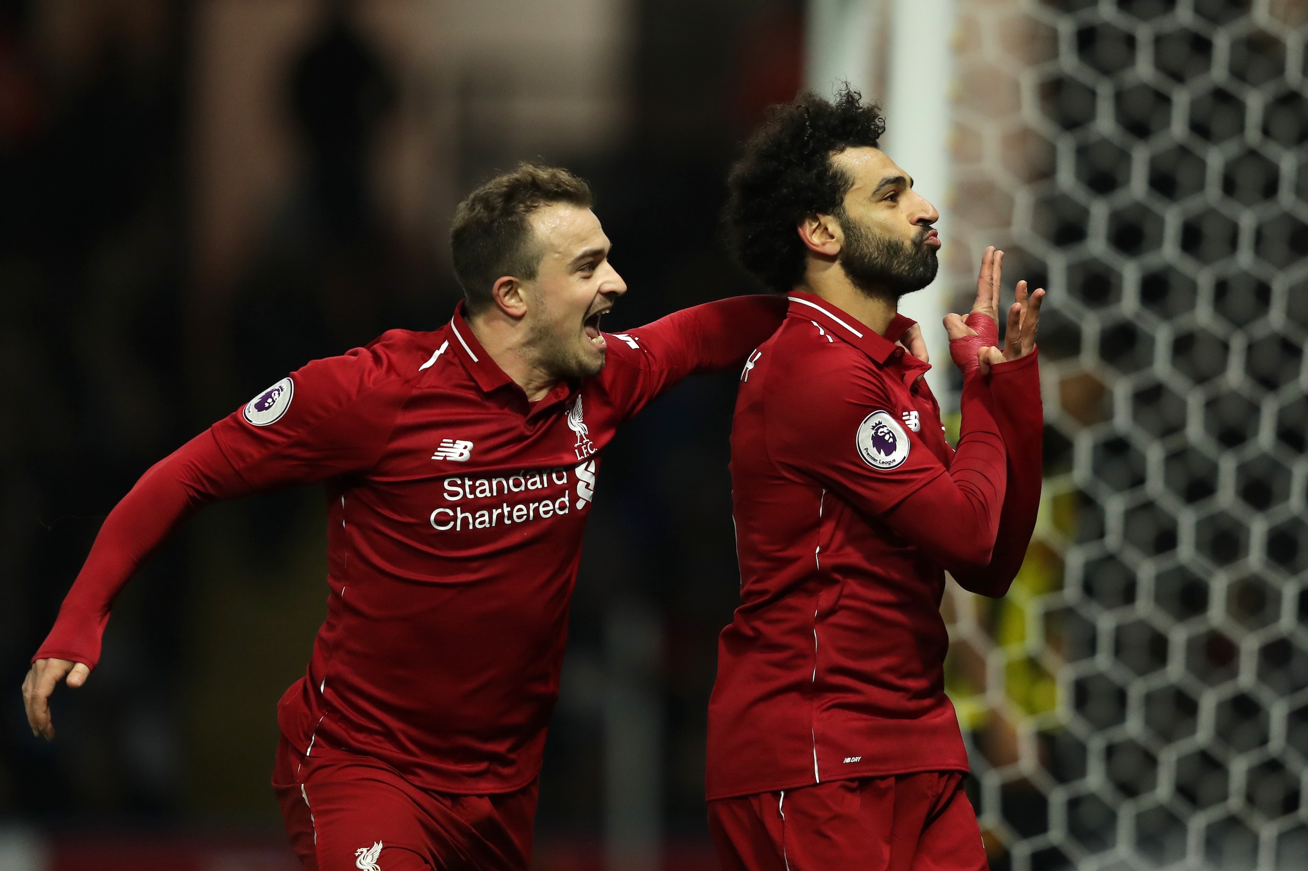 WATFORD, ENGLAND - NOVEMBER 24: Mohamed Salah of Liverpool celebrates after scoring his team's first goal during the Premier League match between Watford FC and Liverpool FC at Vicarage Road on November 24, 2018 in Watford, United Kingdom. (Photo by Ric WATFORD, ENGLAND - NOVEMBER 24: Mohamed Salah of Liverpool celebrates after scoring his team's first goal during the Premier League match between Watford FC and Liverpool FC at Vicarage Road on November 24, 2018 in Watford, United Kingdom. (Photo by Ric
