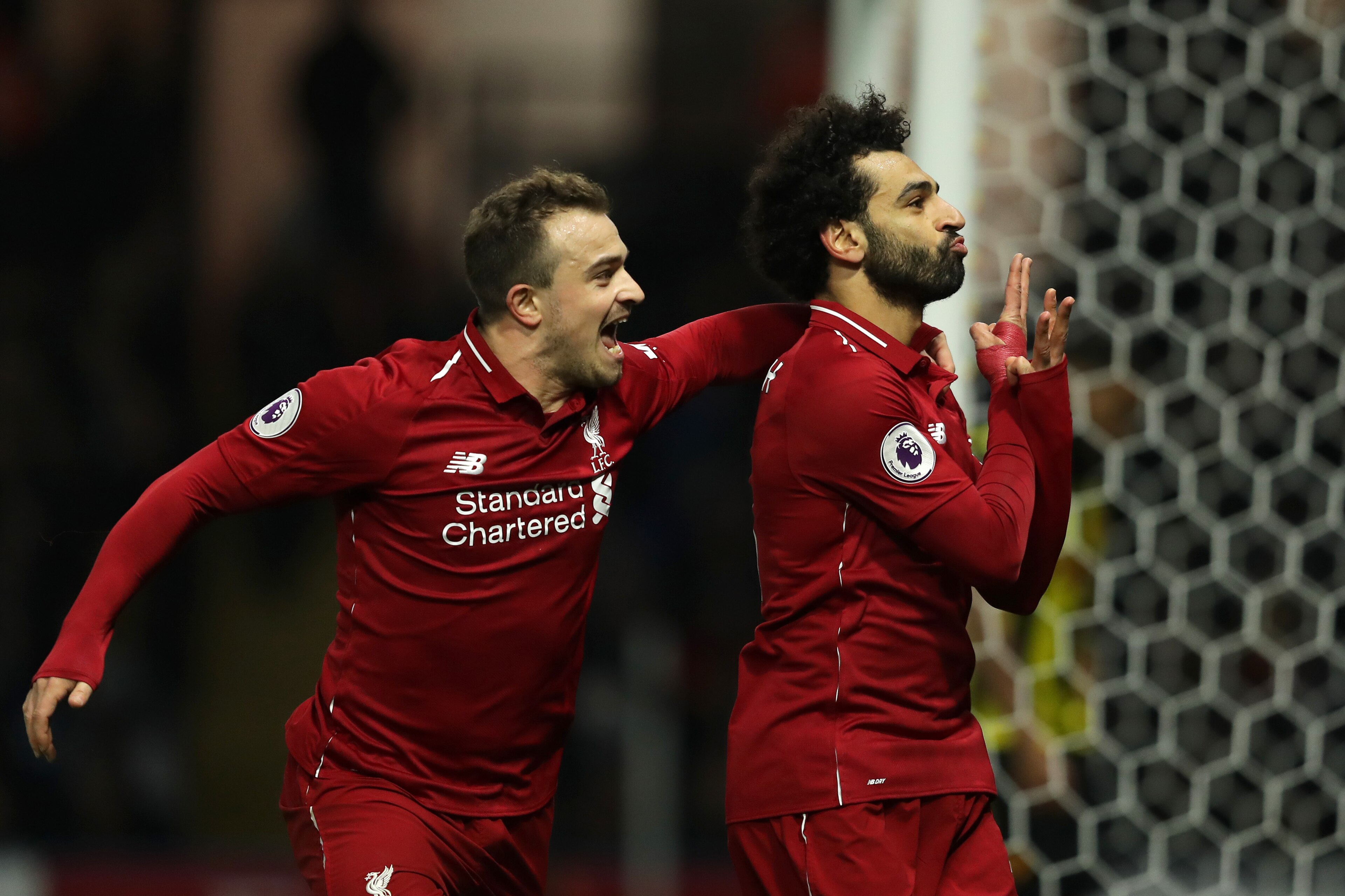 WATFORD, ENGLAND - NOVEMBER 24: Mohamed Salah of Liverpool celebrates after scoring his team's first goal during the Premier League match between Watford FC and Liverpool FC at Vicarage Road on November 24, 2018 in Watford, United Kingdom. (Photo by Ric WATFORD, ENGLAND - NOVEMBER 24: Mohamed Salah of Liverpool celebrates after scoring his team's first goal during the Premier League match between Watford FC and Liverpool FC at Vicarage Road on November 24, 2018 in Watford, United Kingdom. (Photo by Ric