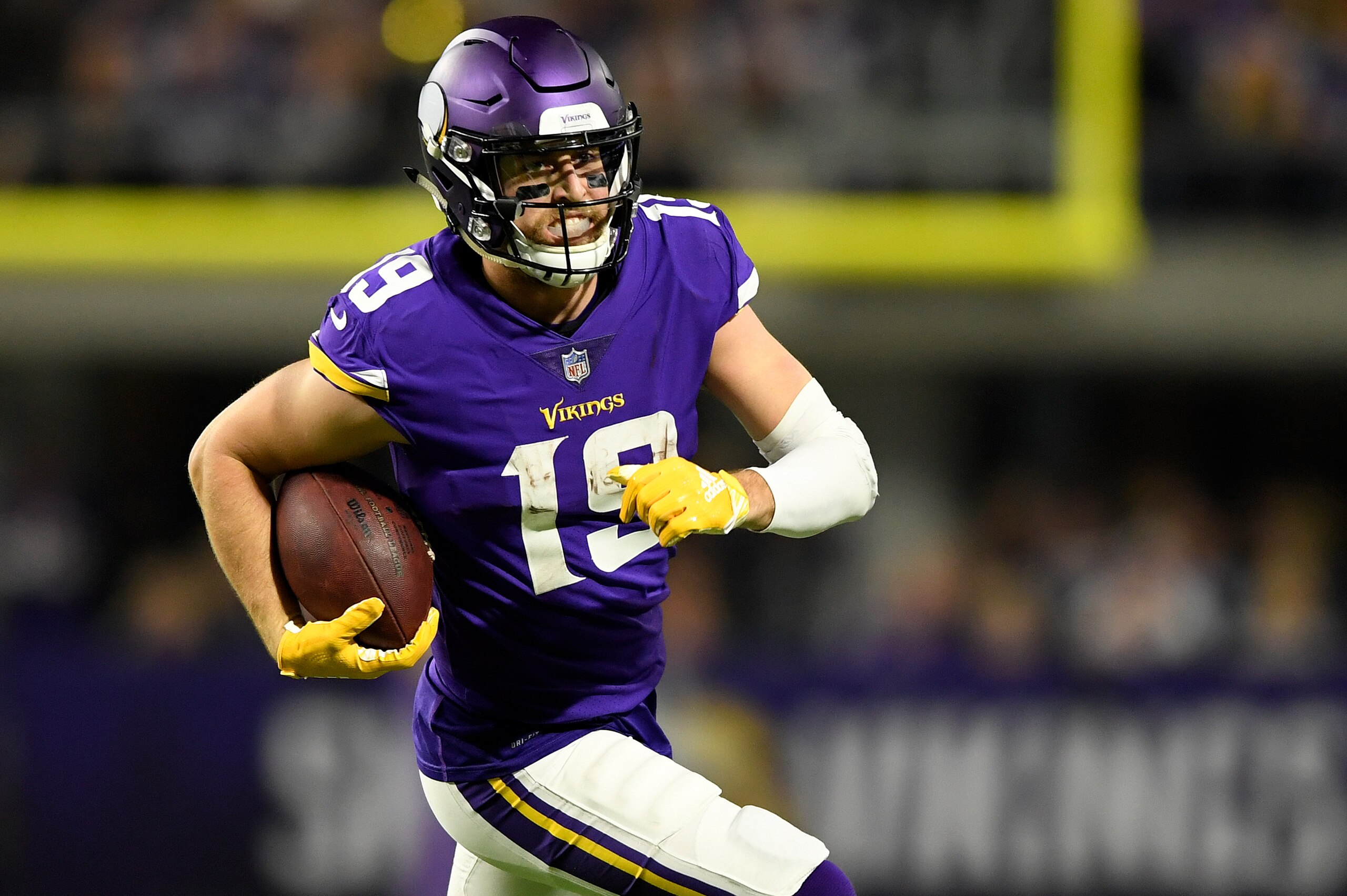 MINNEAPOLIS, MN - NOVEMBER 25: Adam Thielen #19 of the Minnesota Vikings runs with the ball after making a catch in the third quarter of the game against the Green Bay Packers at U.S. Bank Stadium on November 25, 2018 in Minneapolis, Minnesota. (Photo by MINNEAPOLIS, MN - NOVEMBER 25: Adam Thielen #19 of the Minnesota Vikings runs with the ball after making a catch in the third quarter of the game against the Green Bay Packers at U.S. Bank Stadium on November 25, 2018 in Minneapolis, Minnesota. (Photo by