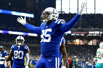 INDIANAPOLIS, INDIANA - NOVEMBER 25: Eric Ebron #85 of the Indianapolis Colts celebrates after scoring a touchdown in the game against Miami Dolphins in the first quarter at Lucas Oil Stadium on November 25, 2018 in Indianapolis, Indiana. (Photo by Stacy 