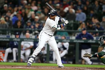 SEATTLE - SEPTEMBER 24:  Robinson Canó #22 of the Seattle Mariners bats during the game against the Oakland Athletics at Safeco Field on September 24, 2018 in Seattle, Washington.  The Athletics defeated the Mariners 7-3.  (Photo by Rob Leiter/MLB Photos 