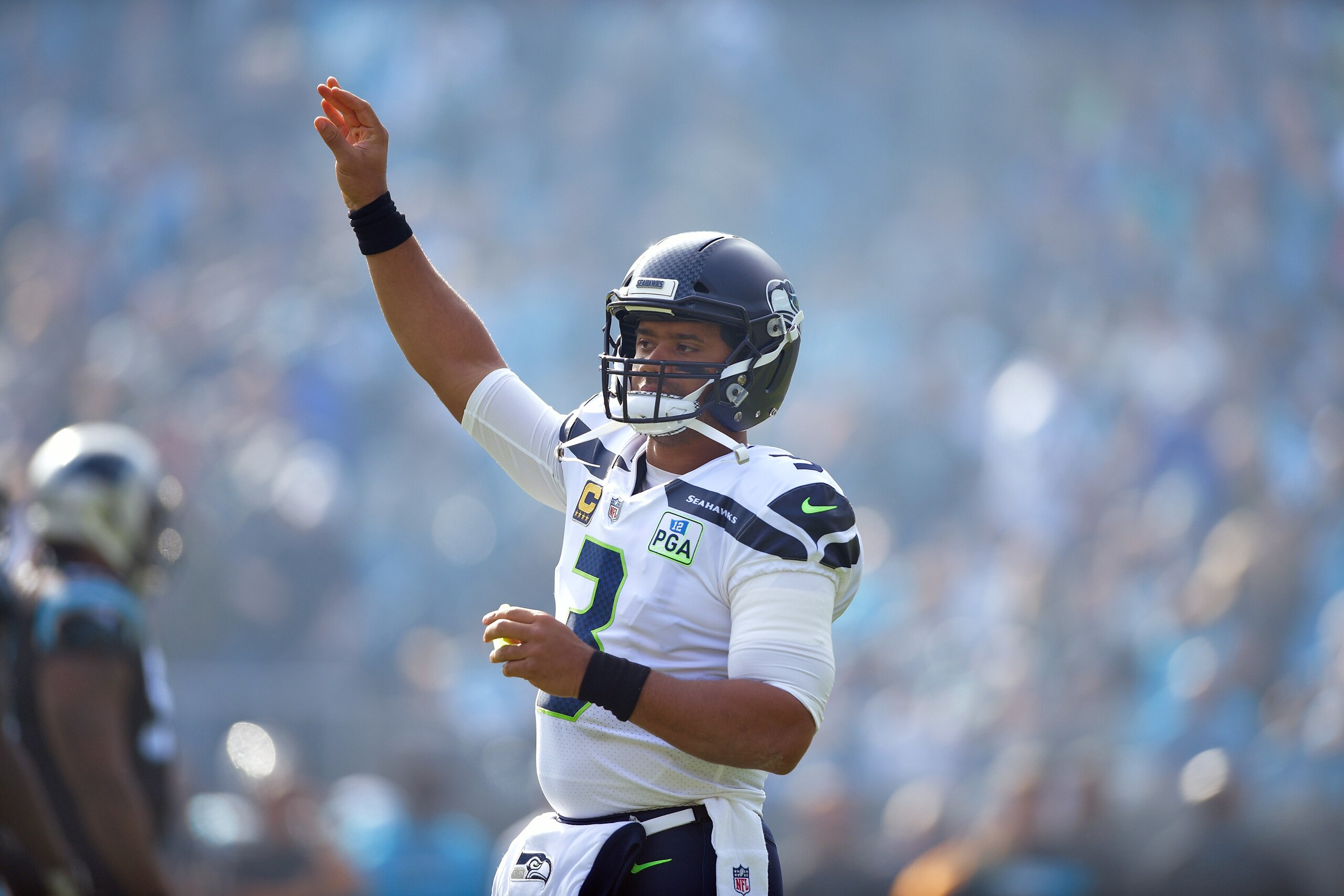 CHARLOTTE, NC - NOVEMBER 25:  Russell Wilson #3 of the Seattle Seahawks against the Carolina Panthers during the first half of their game at Bank of America Stadium on November 25, 2018 in Charlotte, North Carolina.  (Photo by Grant Halverson/Getty Images