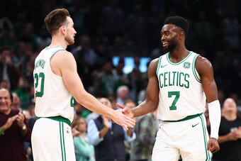 BOSTON, MA - OCTOBER 14: Gordon Hayward #20 high fives Jaylen Brown #7 of the Boston Celtics during a game against ethics's Philadelphia 76ers at TD Garden on October 16, 2018 in Boston, Massachusetts. NOTE TO USER: User expressly acknowledges and agrees 