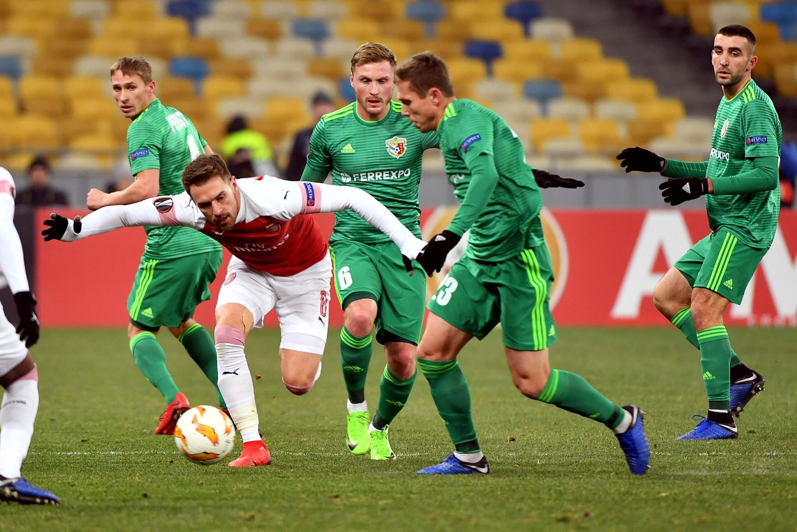 Vorskla's Ukrainian defender Vadym Sapay (2nd-R) vies for the ball with Arsenal's Welsh midfielder Aaron Ramsey (L) during the UEFA Europa League Group E football match between Vorskla and Arsenal at the Olympiyski Stadium, in Kiev, on November 29, 2018. Vorskla's Ukrainian defender Vadym Sapay (2nd-R) vies for the ball with Arsenal's Welsh midfielder Aaron Ramsey (L) during the UEFA Europa League Group E football match between Vorskla and Arsenal at the Olympiyski Stadium, in Kiev, on November 29, 2018.