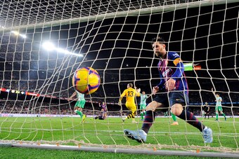 Barcelona's Argentinian forward Lionel Messi goes for the ball after scoring a goal during the Spanish league football match between FC Barcelona and Real Betis at the Camp Nou stadium in Barcelona on November 11, 2018. (Photo by Josep LAGO / AFP)        