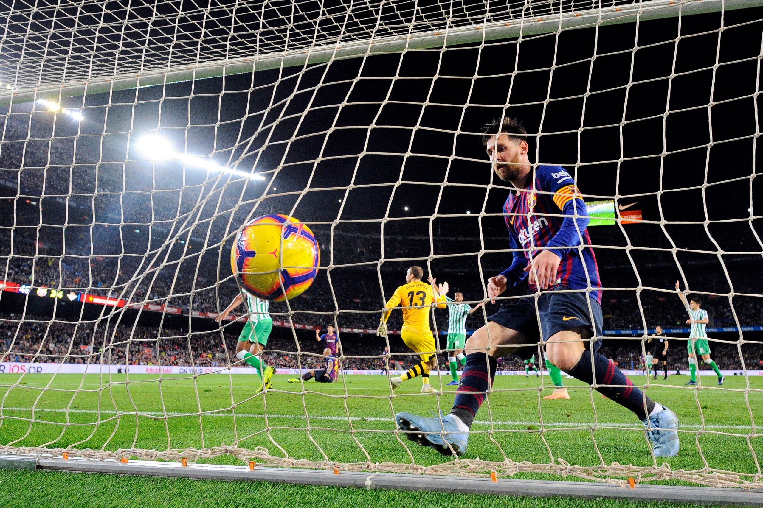 Barcelona's Argentinian forward Lionel Messi goes for the ball after scoring a goal during the Spanish league football match between FC Barcelona and Real Betis at the Camp Nou stadium in Barcelona on November 11, 2018. (Photo by Josep LAGO / AFP) Barcelona's Argentinian forward Lionel Messi goes for the ball after scoring a goal during the Spanish league football match between FC Barcelona and Real Betis at the Camp Nou stadium in Barcelona on November 11, 2018. (Photo by Josep LAGO / AFP)