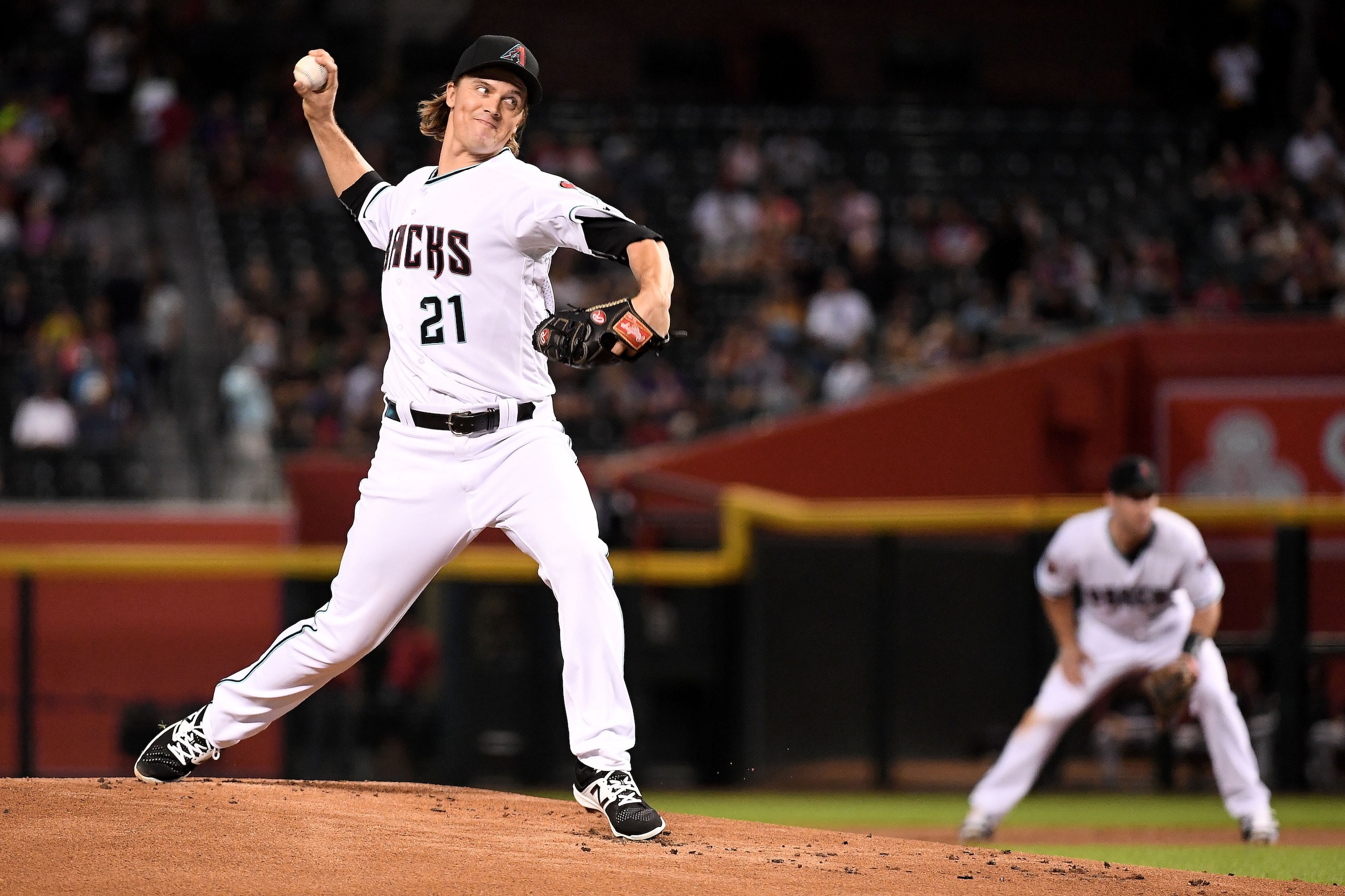 PHOENIX, AZ - SEPTEMBER 21:  Zack Greinke #21 of the Arizona Diamondbacks delivers a pitch in the first inning of the MLB game against the Colorado Rockies at Chase Field on September 21, 2018 in Phoenix, Arizona.  (Photo by Jennifer Stewart/Getty Images)