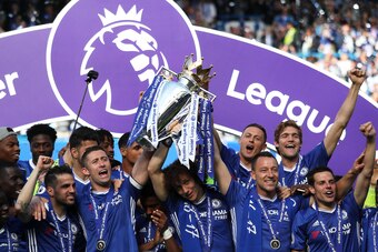 LONDON, ENGLAND - MAY 21:  John Terry and Gary Cahill of Chelsea lift the Premier League trophy as their team-mates celebrate at the end of the Premier League match between Chelsea and Sunderland at Stamford Bridge on May 21, 2017 in London, England.  (Ph