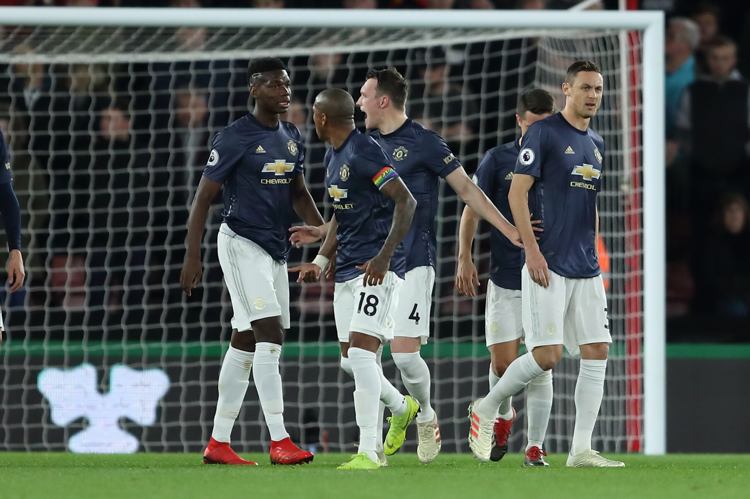 SOUTHAMPTON, ENGLAND - DECEMBER 01: Paul Pogba and Ashley Young and Phil Jones of Manchester United in discussion after Cedric Soares of Southampton scores a goal to make it 2-0 during the Premier League match between Southampton FC and Manchester United 