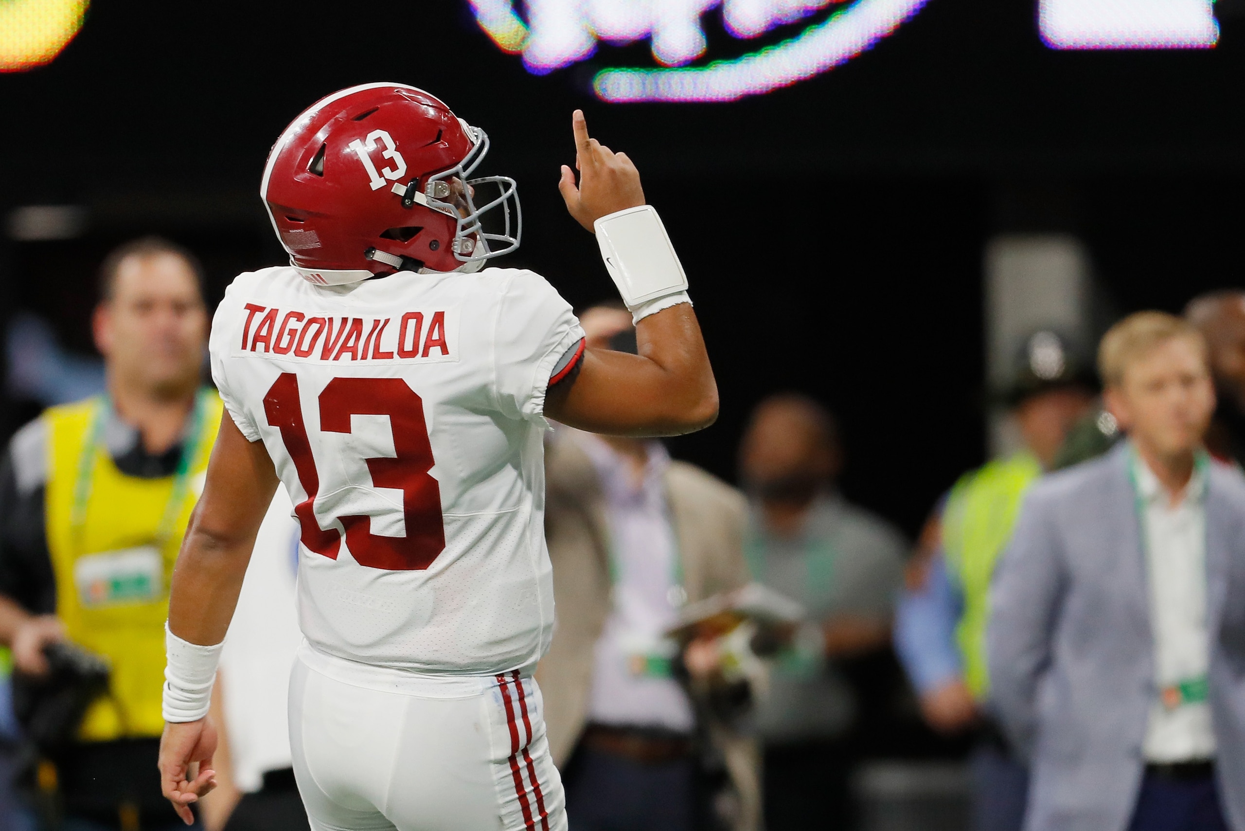 ATLANTA, GA - DECEMBER 01:  Tua Tagovailoa #13 of the Alabama Crimson Tide celebrates after a touchdown by Josh Jacobs #8 (not pictured) in the first half against the Georgia Bulldogs during the 2018 SEC Championship Game at Mercedes-Benz Stadium on Decem