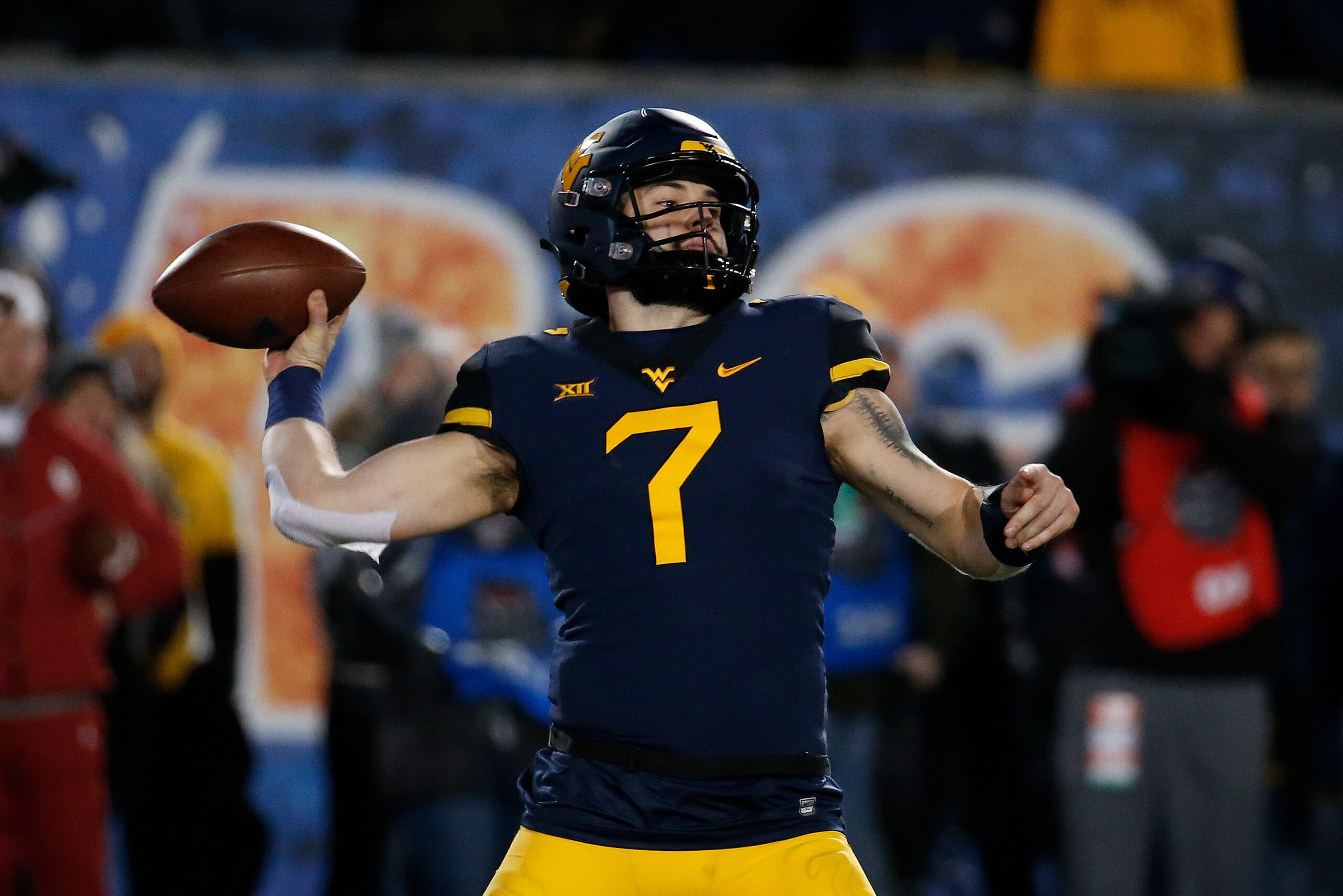 MORGANTOWN, WV - NOVEMBER 23:  Will Grier #7 of the West Virginia Mountaineers in action against the Oklahoma Soonersrs on November 23, 2018 at Mountaineer Field in Morgantown, West Virginia.  (Photo by Justin K. Aller/Getty Images)