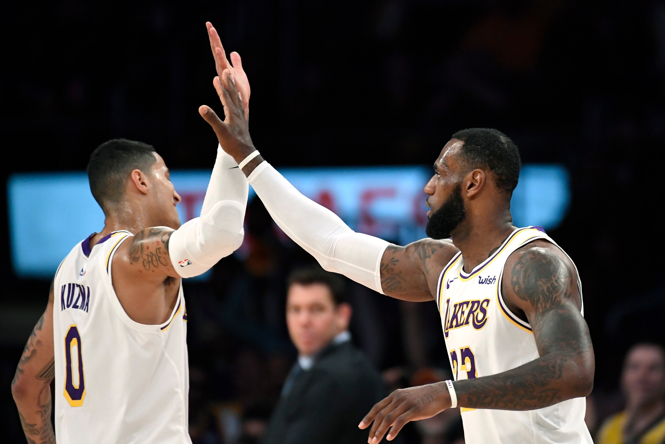 LOS ANGELES, CA - DECEMBER 02: LeBron James #23 of the Los Angeles Lakers reacts celibates with Kyle Kuzma #0 of the Los Angeles Lakers during the second half of a basketball game against Phoenix Suns at Staples Center on December 2, 2018 in Los Angeles, 