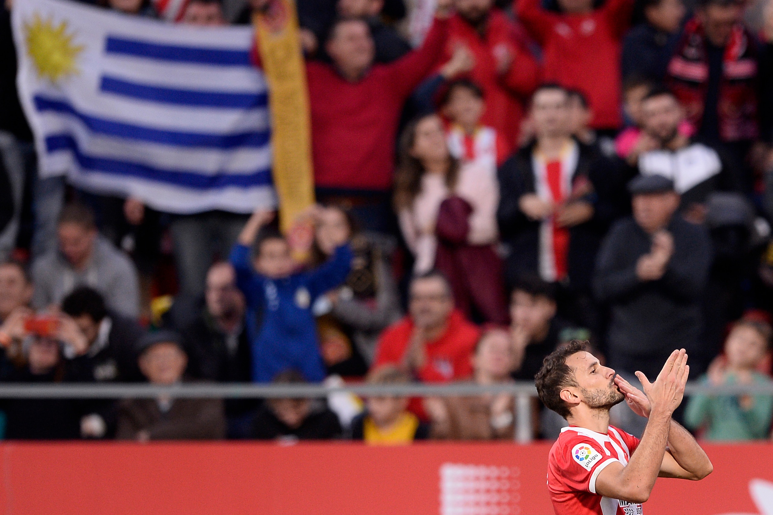 Girona's Uruguayan forward Cristhian Stuani celebrates after scoring a penalty during the Spanish league football match between Girona and Club Atletico de Madrid at the Montilivi stadium in Girona on December 2, 2018. (Photo by Josep LAGO / AFP) ( Girona's Uruguayan forward Cristhian Stuani celebrates after scoring a penalty during the Spanish league football match between Girona and Club Atletico de Madrid at the Montilivi stadium in Girona on December 2, 2018. (Photo by Josep LAGO / AFP) (