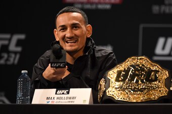 TORONTO, CANADA - DECEMBER 05:  UFC featherweight champion Max Holloway interacts with fans and media during the UFC 231 Press Conference at the Winter Garden Theatre on December 5, 2018 in Toronto, Ontario, Canada. (Photo by Josh Hedges/Zuffa LLC/Zuffa L