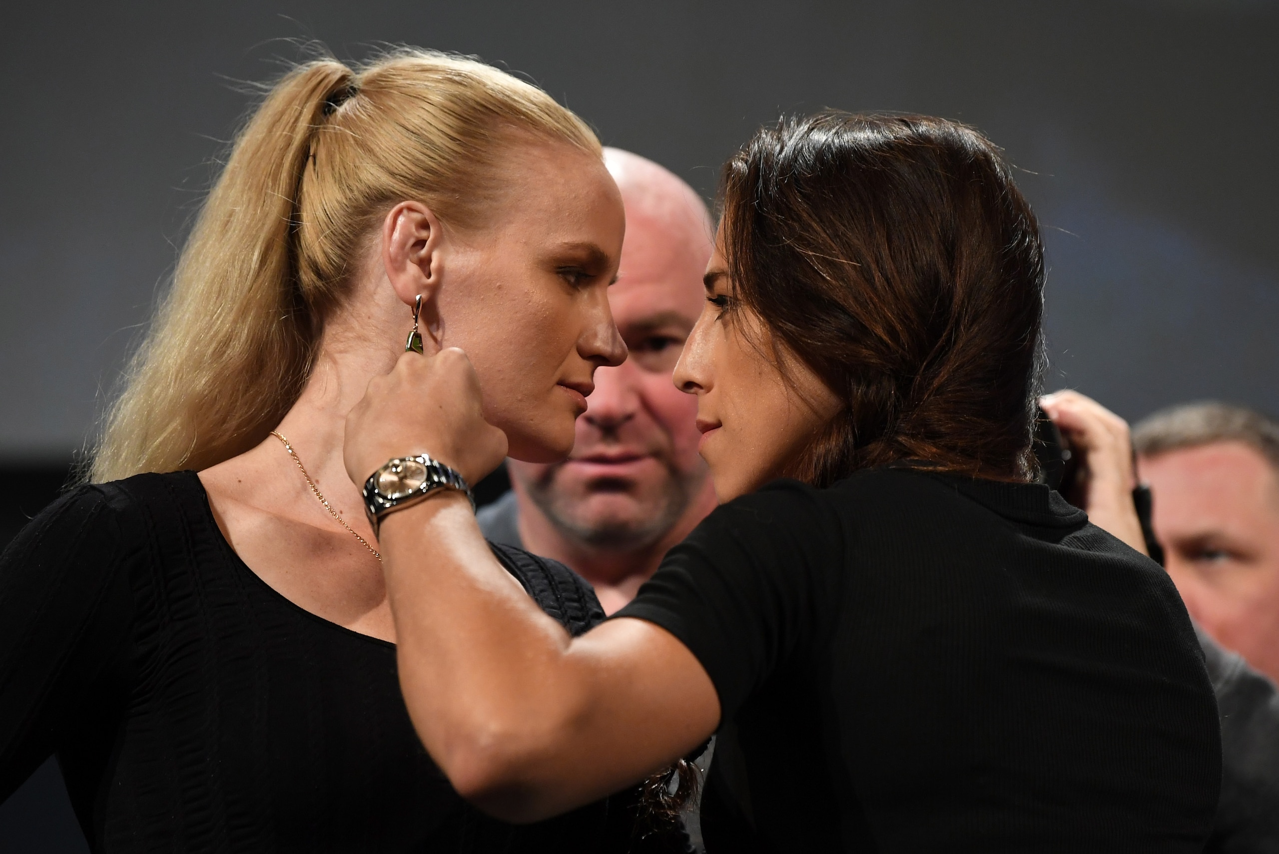 TORONTO, CANADA - DECEMBER 05:  (L-R) Opponents Valentina Shevchenko of Kyrgyzstan and Joanna Jedrzejczyk of Poland face off during the UFC 231 Press Conference at the Winter Garden Theatre on December 5, 2018 in Toronto, Ontario, Canada. (Photo by Josh H