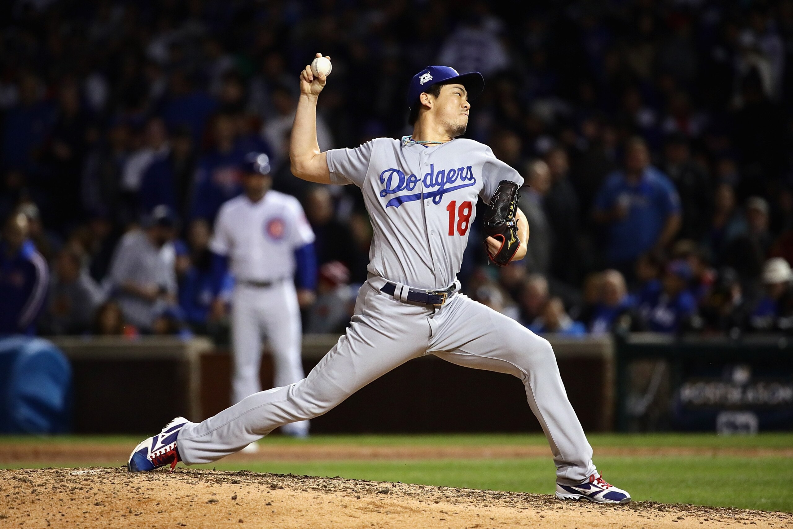 CHICAGO, IL - OCTOBER 19:  Kenta Maeda #18 of the Los Angeles Dodgers pitches in the seventh inning against the Chicago Cubs during game five of the National League Championship Series at Wrigley Field on October 19, 2017 in Chicago, Illinois.  (Photo by 