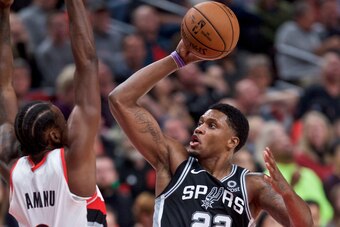 Rudy Gay shoots over Al-Farouq Aminu.