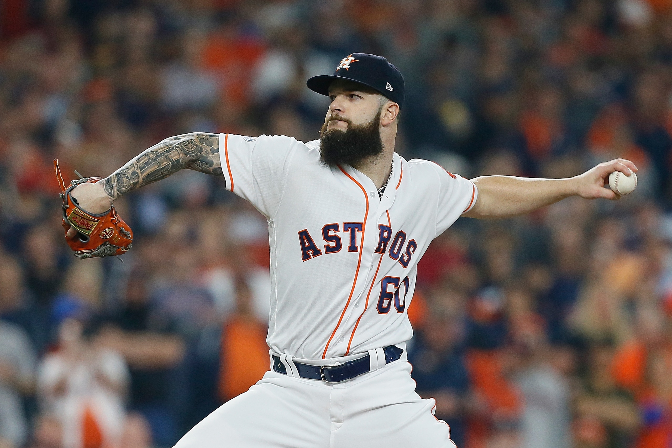 HOUSTON, TX - OCTOBER 16:  Dallas Keuchel #60 of the Houston Astros pitches in the first inning against the Boston Red Sox during Game Three of the American League Championship Series at Minute Maid Park on October 16, 2018 in Houston, Texas.  (Photo by B