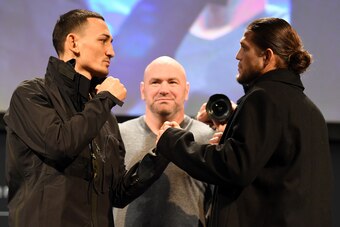 TORONTO, CANADA - DECEMBER 05:  (L-R) Opponents Max Holloway and Brian Ortega face off during the UFC 231 Press Conference at the Winter Garden Theatre on December 5, 2018 in Toronto, Ontario, Canada. (Photo by Josh Hedges/Zuffa LLC/Zuffa LLC via Getty Im