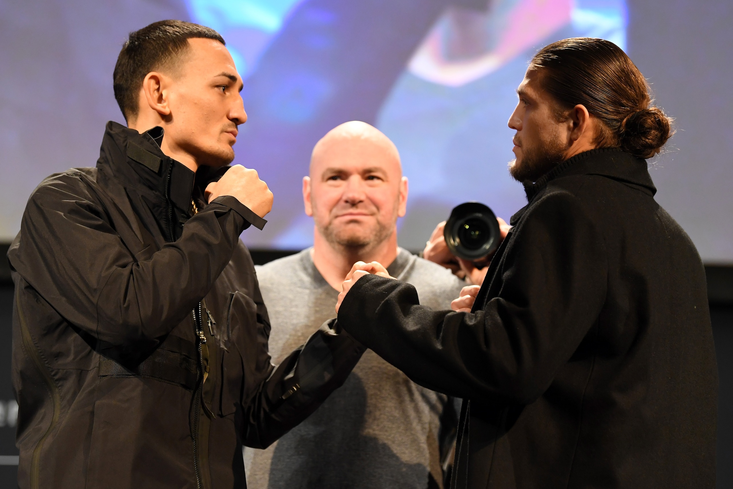 TORONTO, CANADA - DECEMBER 05:  (L-R) Opponents Max Holloway and Brian Ortega face off during the UFC 231 Press Conference at the Winter Garden Theatre on December 5, 2018 in Toronto, Ontario, Canada. (Photo by Josh Hedges/Zuffa LLC/Zuffa LLC via Getty Im