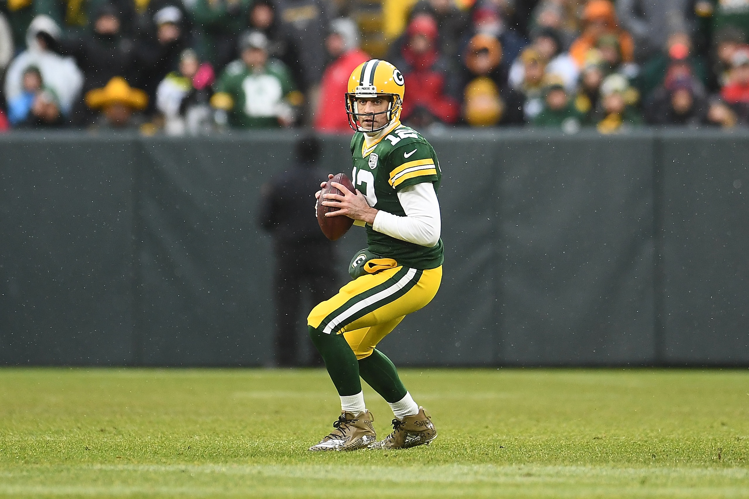 GREEN BAY, WISCONSIN - DECEMBER 02:  Aaron Rodgers #12 of the Green Bay Packers looks to pass during a game against the Arizona Cardinals at Lambeau Field on December 02, 2018 in Green Bay, Wisconsin.  The Cardinals defeated the Packers 20-17. (Photo by S