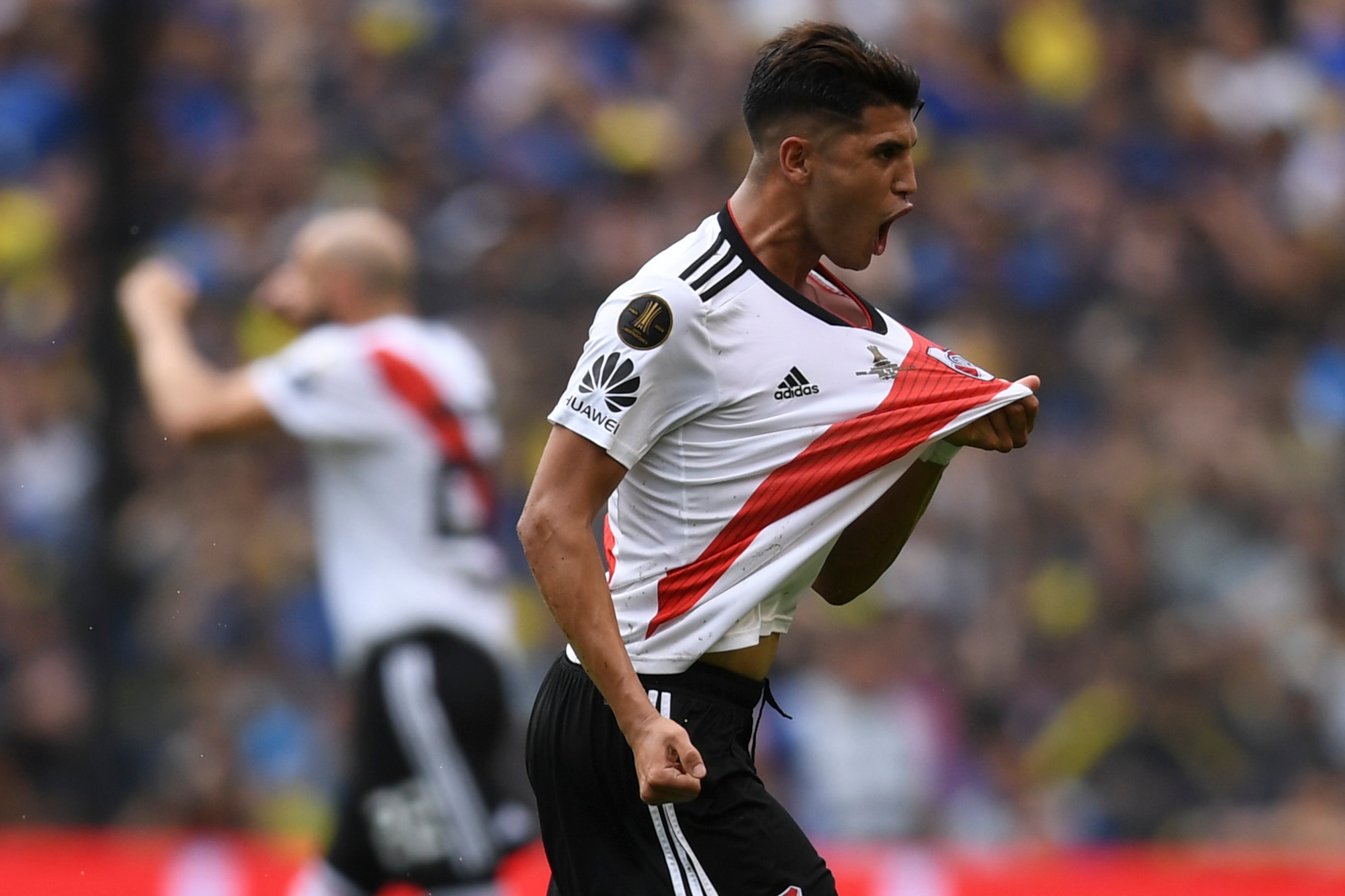 River Plate's Exequiel Palacios celebrates after teammate Lucas Pratto (out of frame) scored their team's first goal against Boca Juniors, during their first leg match of the all-Argentine Copa Libertadores final, at La Bombonera stadium in Buenos Aires, 
