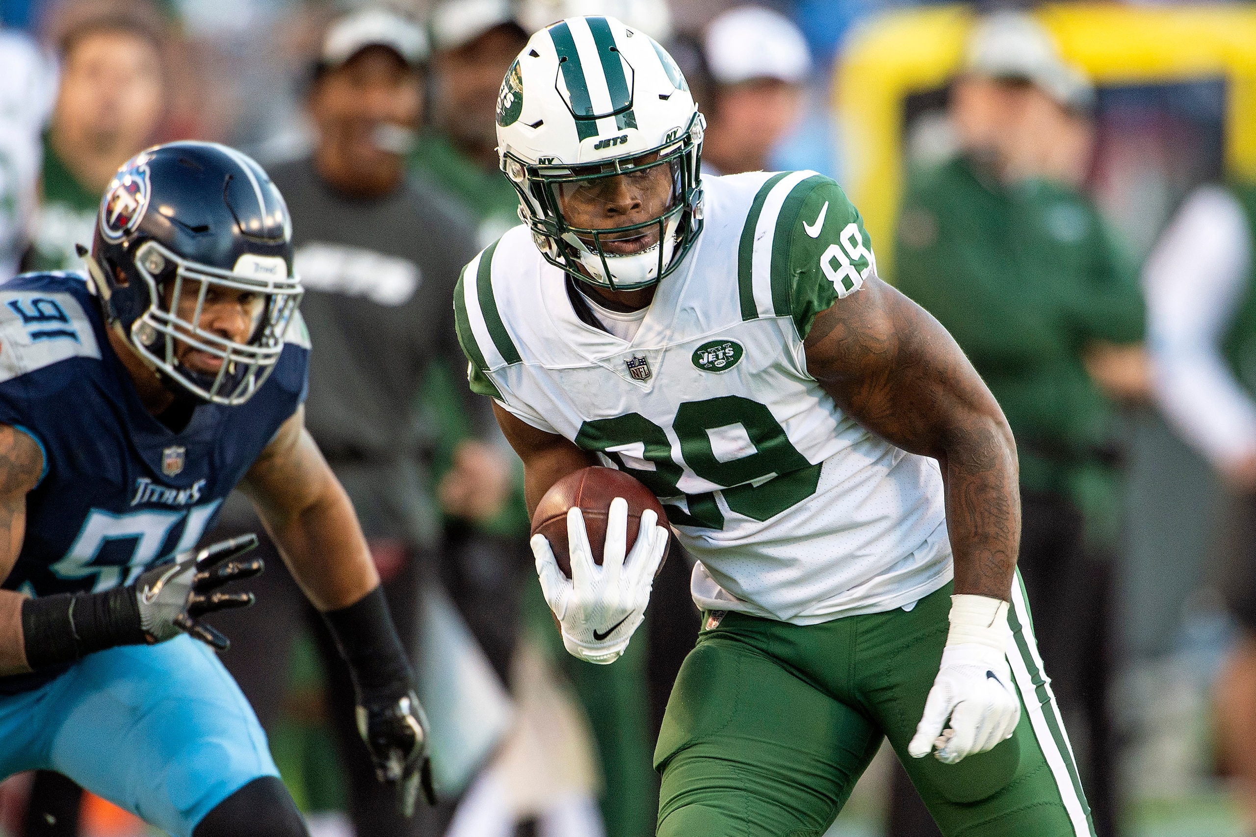 NASHVILLE, TN - DECEMBER 2: Tight end Chris Herndon #89 of the New York Jets carries the ball against the Tennessee Titans during a NFL game at Nissan Stadium on December 2, 2018 in Nashville, Tennessee. (Photo by Ronald C. Modra/Sports Imagery/Getty Im NASHVILLE, TN - DECEMBER 2: Tight end Chris Herndon #89 of the New York Jets carries the ball against the Tennessee Titans during a NFL game at Nissan Stadium on December 2, 2018 in Nashville, Tennessee. (Photo by Ronald C. Modra/Sports Imagery/Getty Im