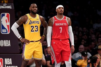 LOS ANGELES, CA - OCTOBER 20:  LeBron James #23 of the Los Angeles Lakers and Carmelo Anthony #7 of the Houston Rockets wait for and inbound at Staples Center on October 20, 2018 in Los Angeles, California.  (Photo by Harry How/Getty Images)