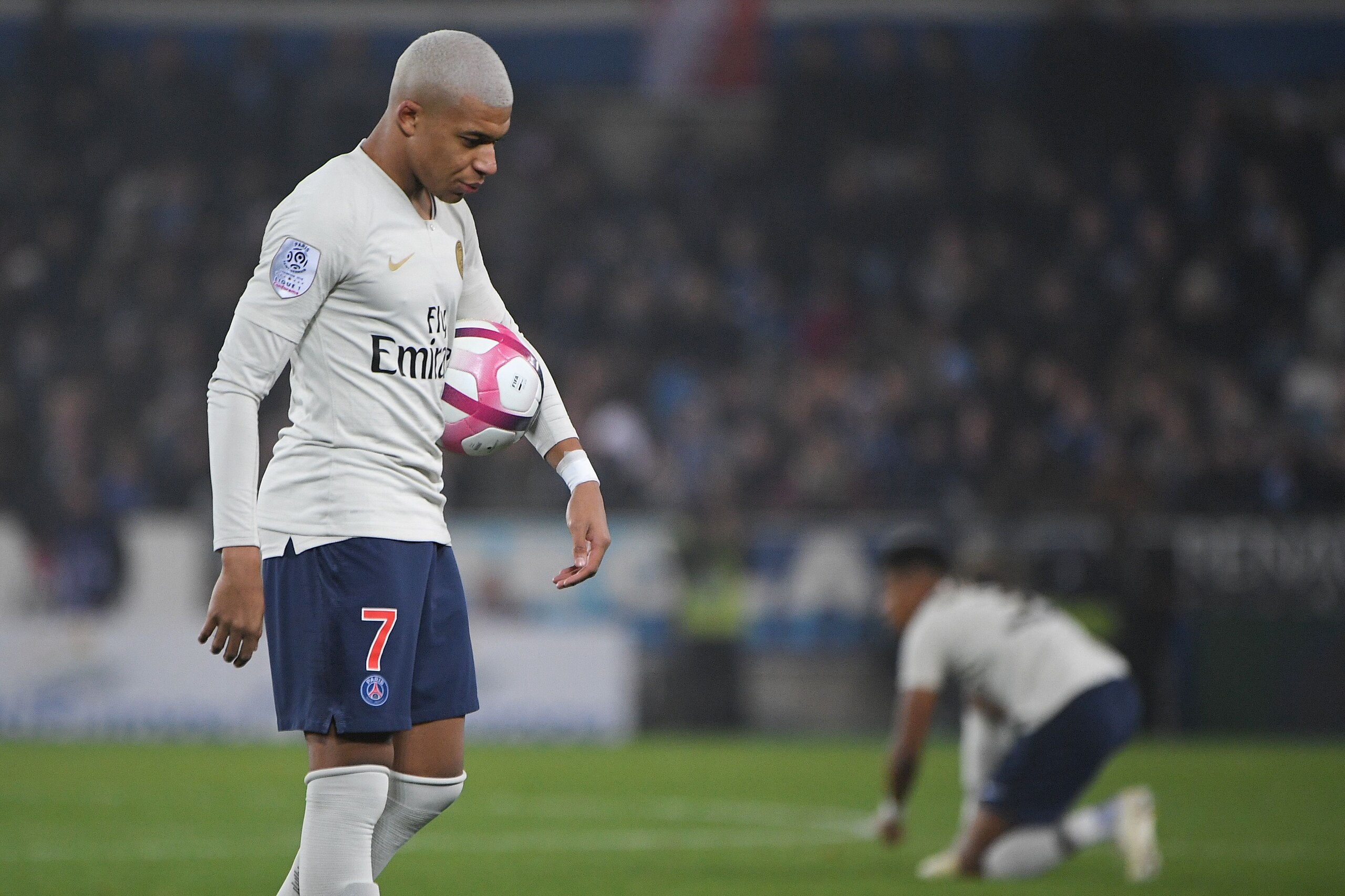 Paris Saint-Germain's French forward Kylian Mbappe reacts during the French L1 football match between Strasbourg and Paris Saint-Germain (PSG) at the Stade de la Meinau stadium, in Strasbourg, on December 5, 2018. (Photo by Patrick HERTZOG / AFP)        (