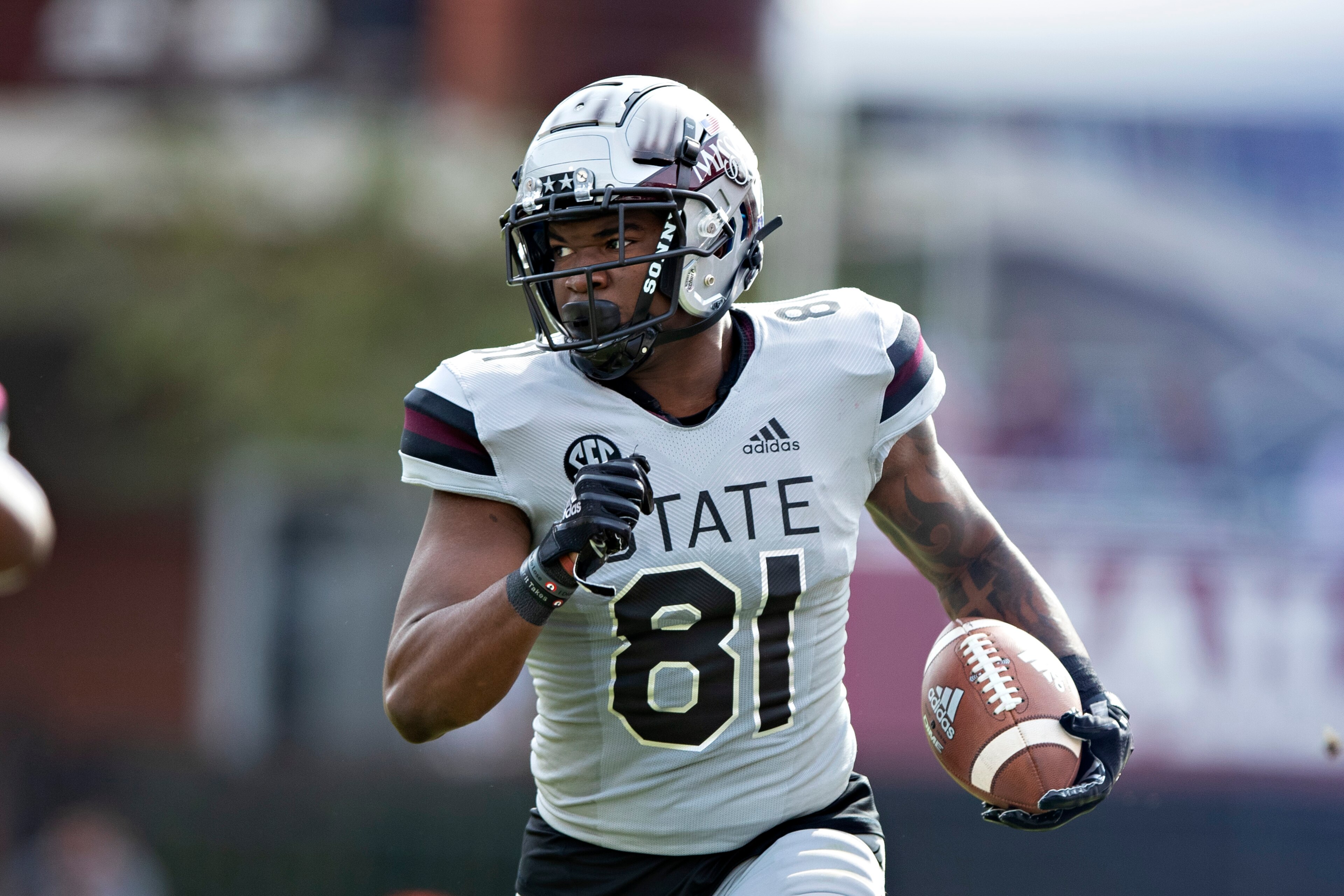 STARKVILLE, MS - NOVEMBER 17:  Justin Johnson #81 of the Mississippi State Bulldogs runs the ball in the second half of a game against the Arkansas Razorbacks at Davis Wade Stadium on November 17, 2018 in Starkville, Mississippi.  The Bulldogs defeated th