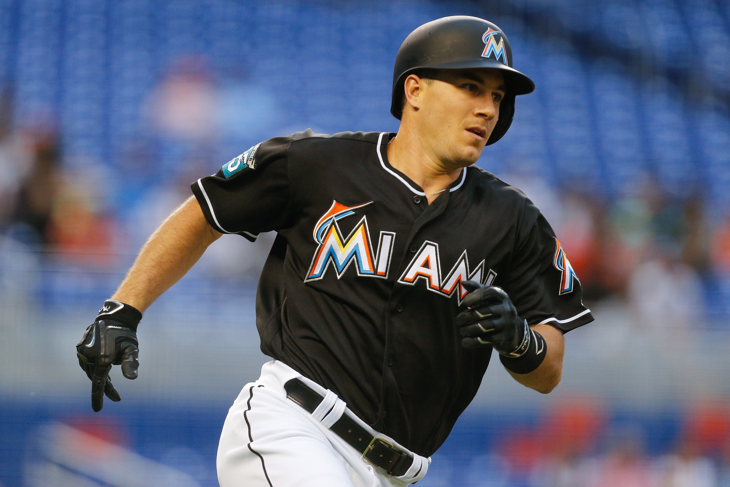 MIAMI, FL - MAY 11:  J.T. Realmuto #11 of the Miami Marlins runs bases against the Atlanta Braves at Marlins Park on May 11, 2018 in Miami, Florida.  (Photo by Michael Reaves/Getty Images)