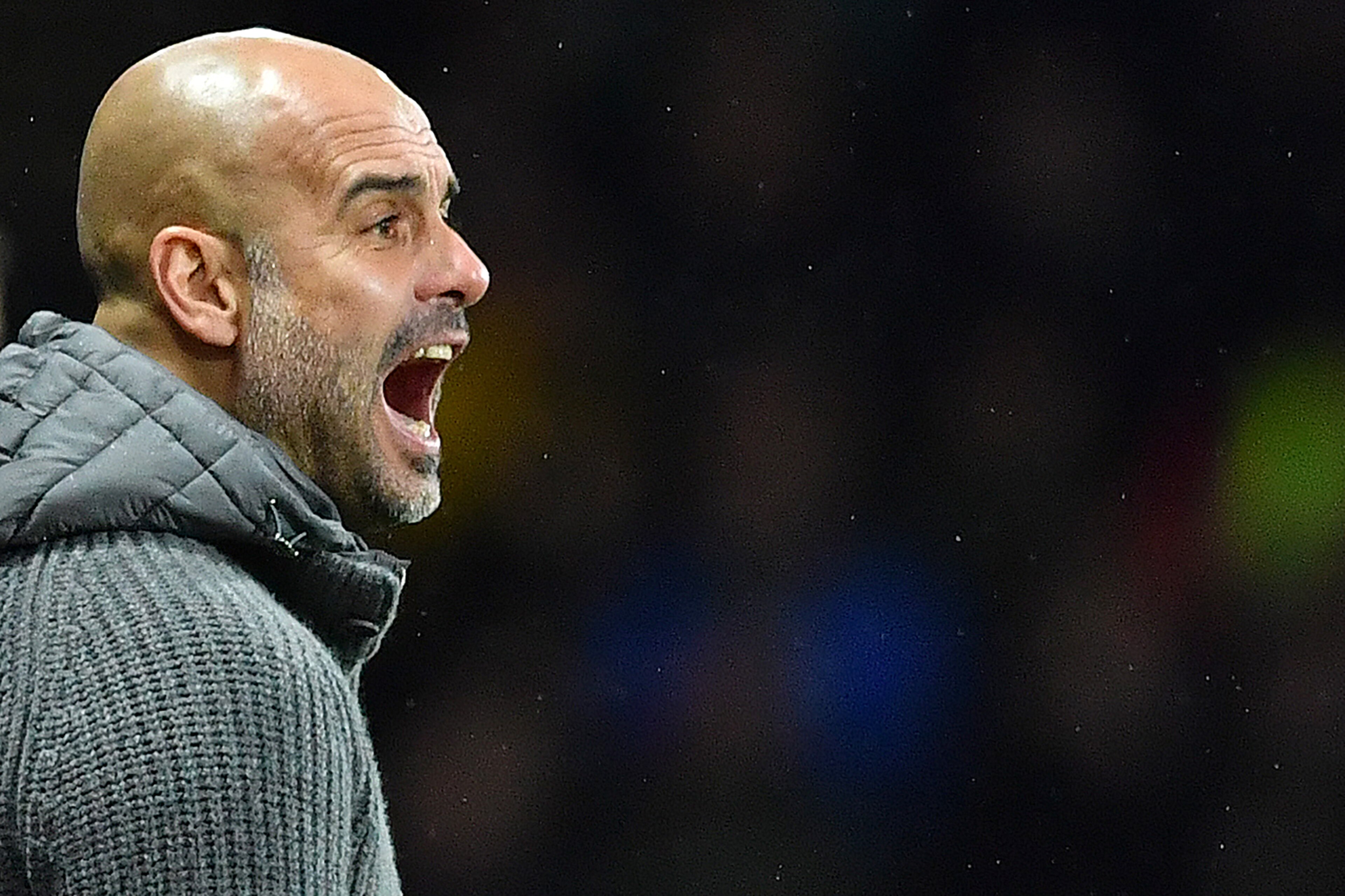 Manchester City's Spanish manager Pep Guardiola shouts instructions to his players from the touchline during the English Premier League football match between Watford and Manchester City at Vicarage Road Stadium in Watford, north of London on December 4, 