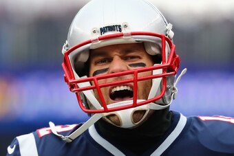 FOXBORO, MA - DECEMBER 24:  Tom Brady #12 of the New England Patriots yells as he runs onto the field before the game against the Buffalo Bills at Gillette Stadium on December 24, 2017 in Foxboro, Massachusetts.  (Photo by Tim Bradbury/Getty Images)