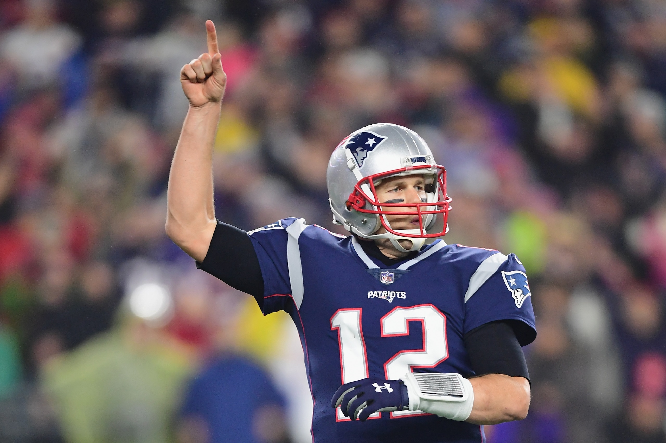 FOXBOROUGH, MA - DECEMBER 02: Tom Brady #12 of the New England Patriots celebrates after a rushing touchdown by James Develin #46 (not pictured) during the fourth quarter against the Minnesota Vikings at Gillette Stadium on December 2, 2018 in Foxborough FOXBOROUGH, MA - DECEMBER 02: Tom Brady #12 of the New England Patriots celebrates after a rushing touchdown by James Develin #46 (not pictured) during the fourth quarter against the Minnesota Vikings at Gillette Stadium on December 2, 2018 in Foxborough