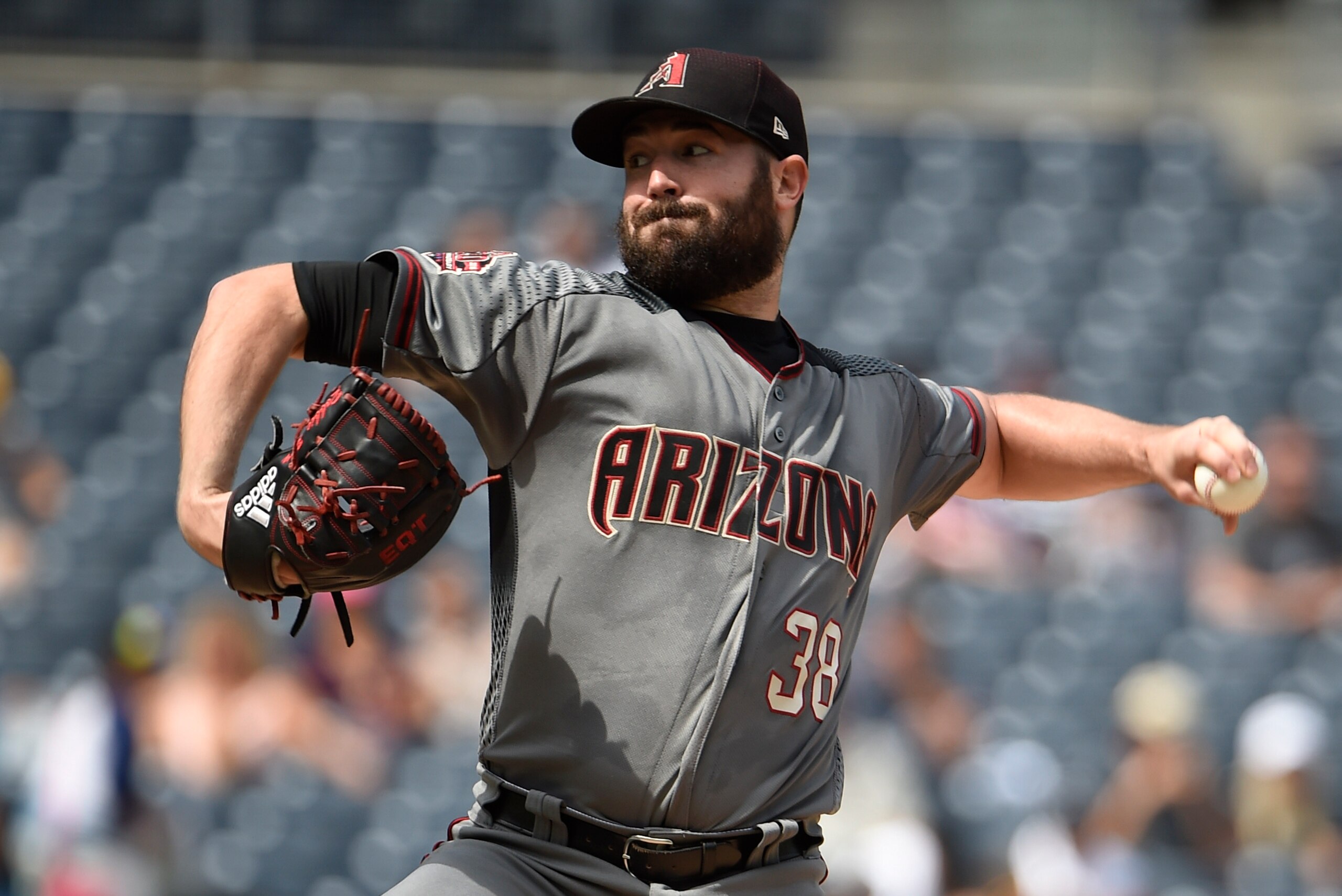SAN DIEGO, CA - SEPTEMBER 30: Robbie Ray #38 of the Arizona Diamondbacks pitches during the first inning of a baseball game against the San Diego Padres at PETCO Park on September 30, 2018 in San Diego, California. (Photo by Denis Poroy/Getty Images)