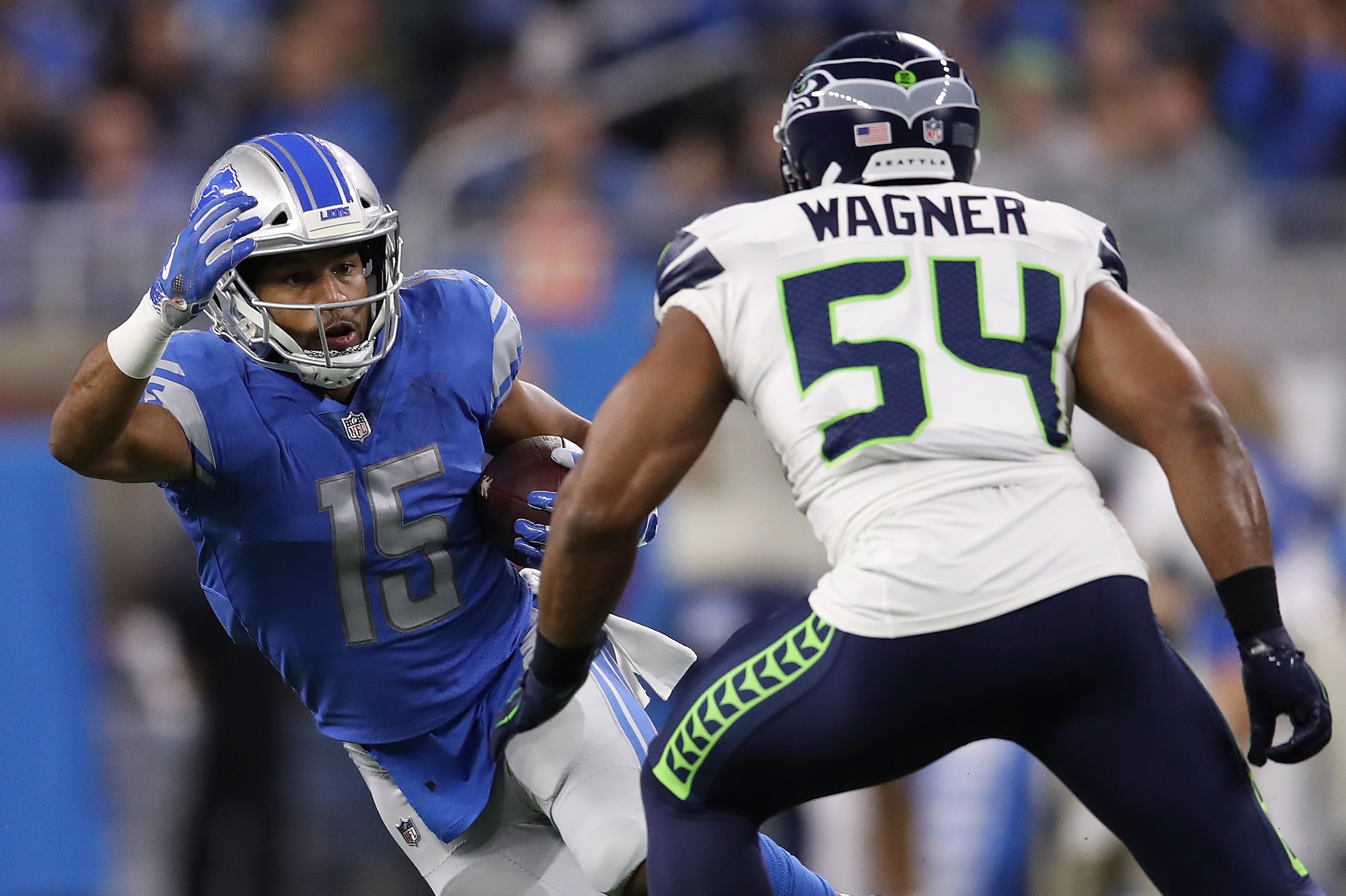 DETROIT, MI - OCTOBER 28: Golden Tate #15 of the Detroit Lions looks to pick up yardage against Bobby Wagner #54 of the Seattle Seahawks during the second quarter at Ford Field on October 28, 2018 in Detroit, Michigan. (Photo by Gregory Shamus/Getty Image