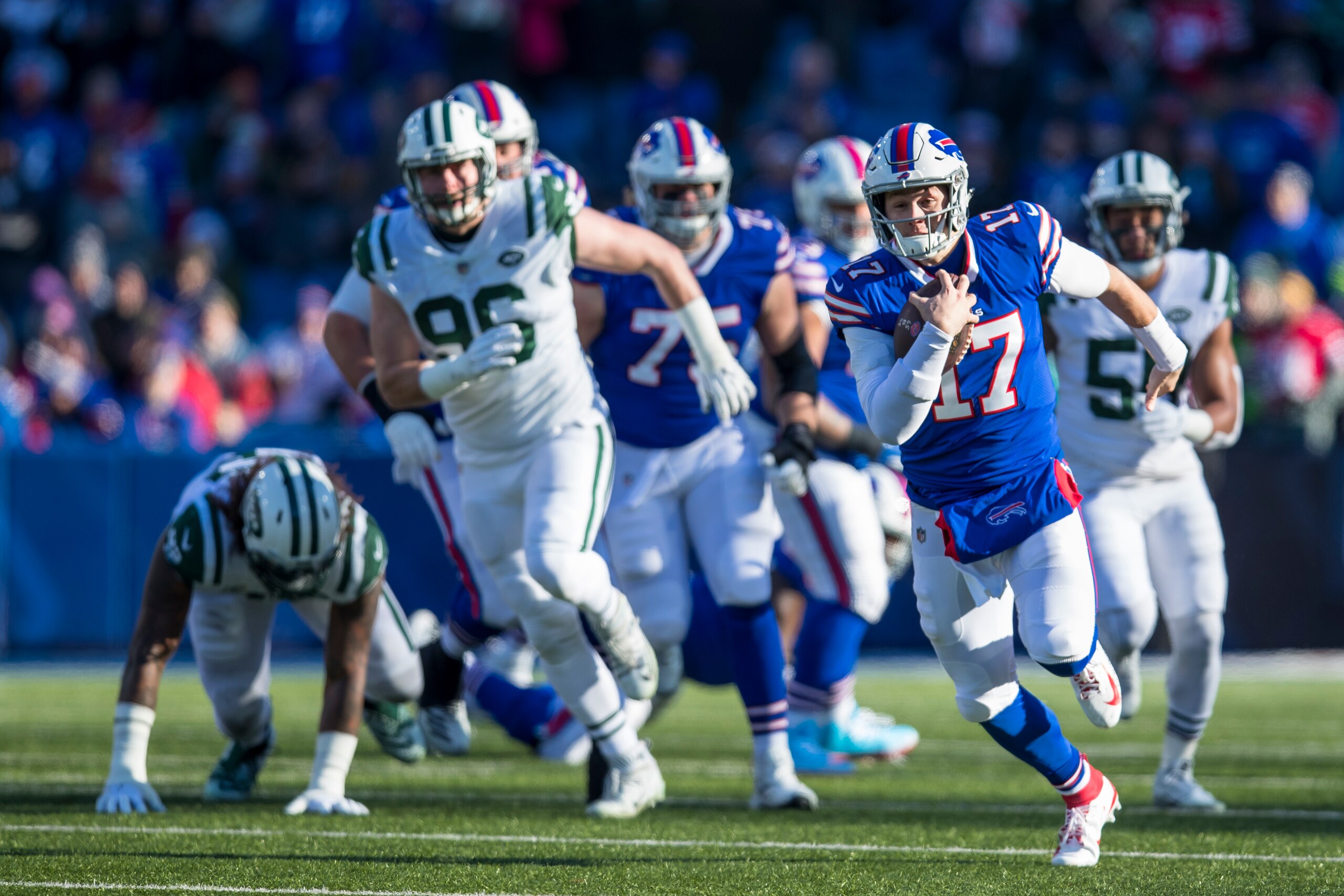 ORCHARD PARK, NY - DECEMBER 09:  Josh Allen #17 of the Buffalo Bills runs with the ball during the first quarter against the New York Jets at New Era Field on December 9, 2018 in Orchard Park, New York. New York defeats Buffalo 27-23. (Photo by Brett Carl