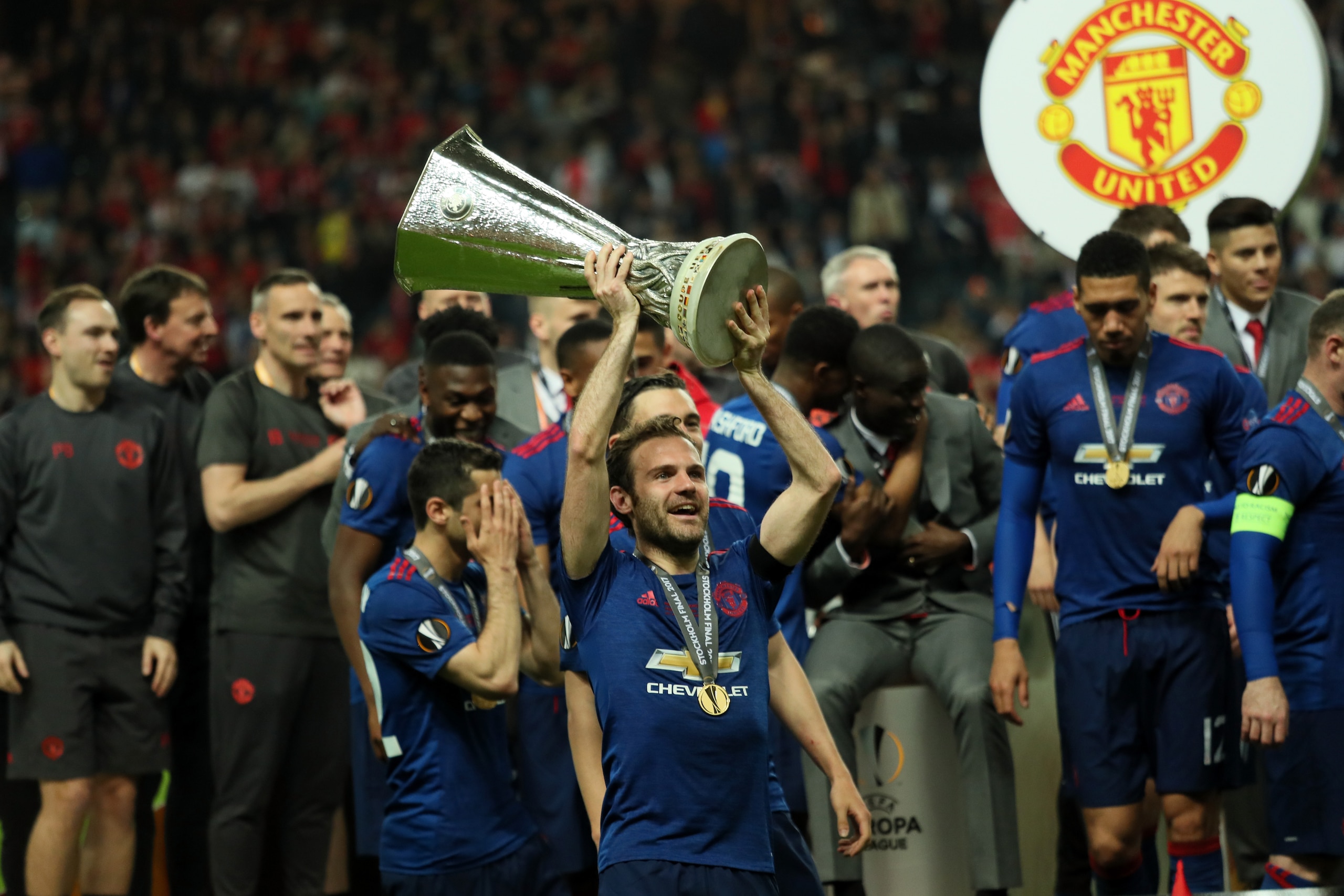 STOCKHOLM, SWEDEN - MAY 24:  Juan Mata of Manchester United celebrates with the trophy at the end of the UEFA Europa League Final between Ajax and Manchester United at Friends Arena on May 24, 2017 in Stockholm, Sweden.  (Photo by Matthew Ashton - AMA/Get