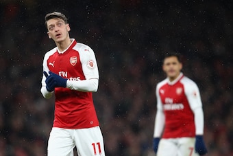 LONDON, ENGLAND - DECEMBER 16: Mesut Ozil and Alexis Sanchez of Arsenal look on during the Premier League match between Arsenal and Newcastle United at Emirates Stadium on December 16, 2017 in London, England. (Photo by Julian Finney/Getty Images) LONDON, ENGLAND - DECEMBER 16: Mesut Ozil and Alexis Sanchez of Arsenal look on during the Premier League match between Arsenal and Newcastle United at Emirates Stadium on December 16, 2017 in London, England. (Photo by Julian Finney/Getty Images)