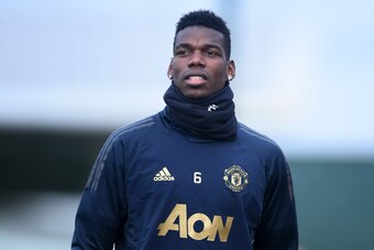 MANCHESTER, ENGLAND - DECEMBER 11:  Paul Pogba of Manchester United looks on during a training session ahead of their UEFA Champions League Group H match against Valencia at Aon Training Complex on December 11, 2018 in Manchester, England.  (Photo by Nath