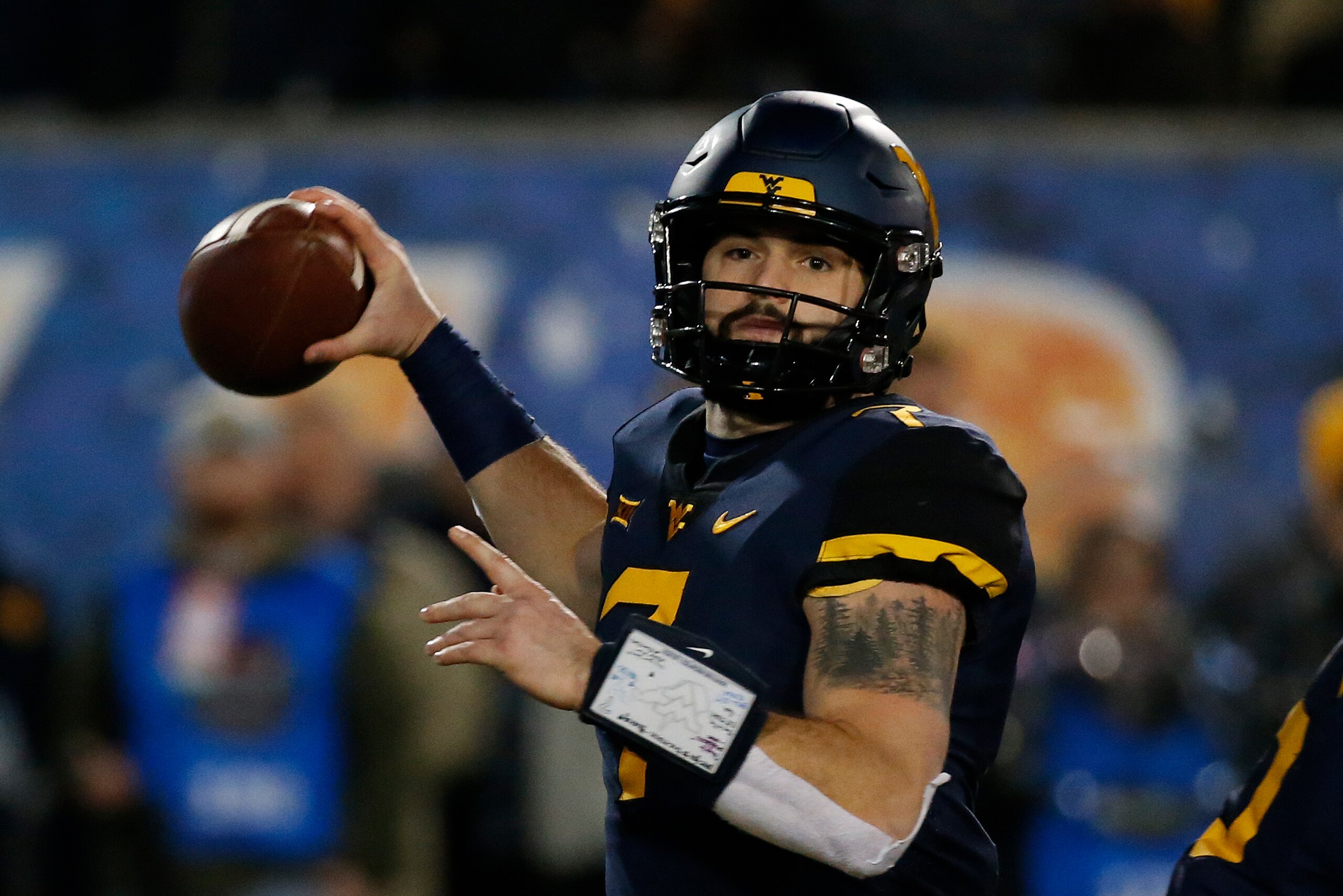 MORGANTOWN, WV - NOVEMBER 23:  Will Grier #7 of the West Virginia Mountaineers in action against the Oklahoma Soonersrs on November 23, 2018 at Mountaineer Field in Morgantown, West Virginia.  (Photo by Justin K. Aller/Getty Images)