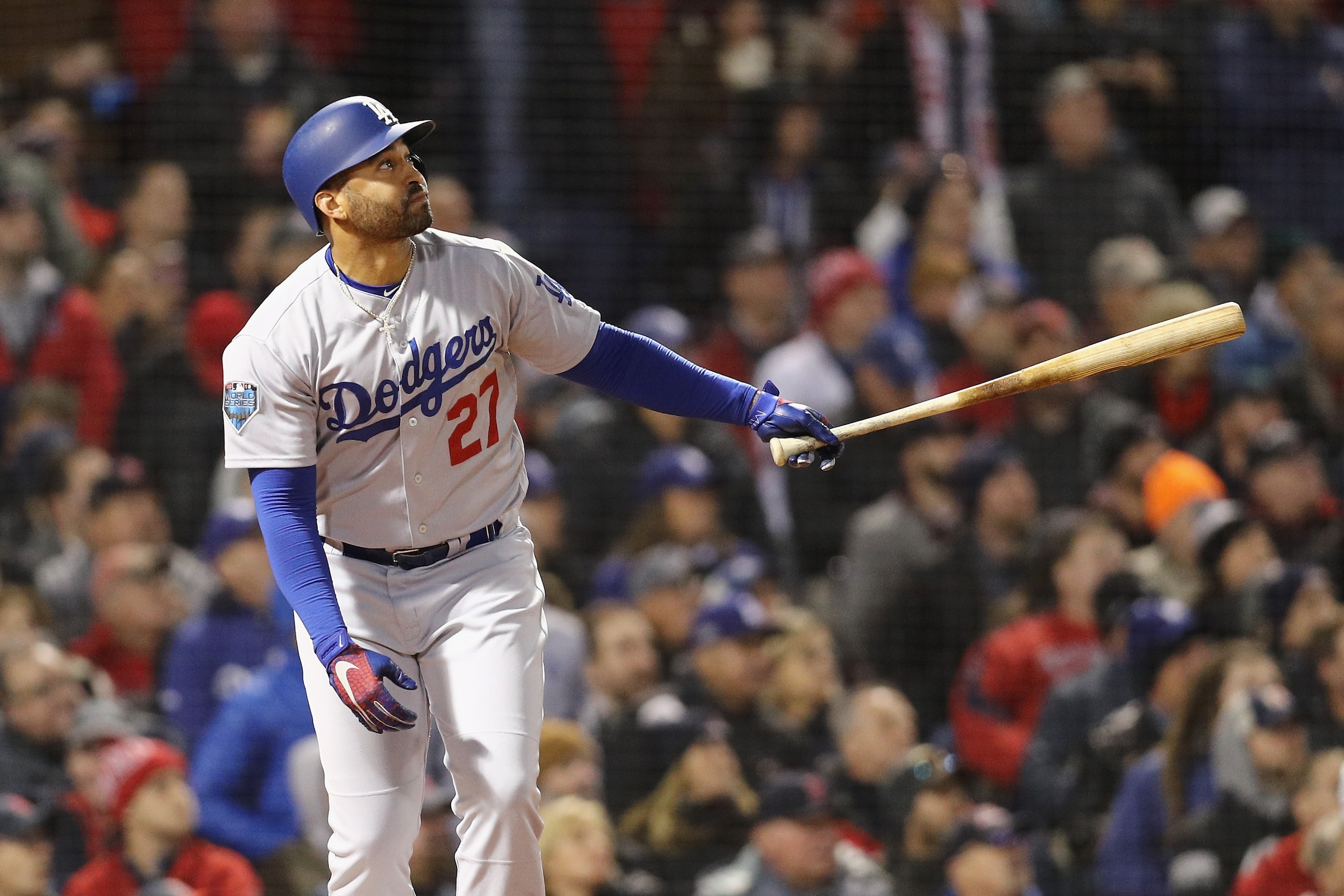 BOSTON, MA - OCTOBER 24:  Matt Kemp #27 of the Los Angeles Dodgers hits an RBI sacrifice fly during the fourth inning against the Boston Red Sox in Game Two of the 2018 World Series at Fenway Park on October 24, 2018 in Boston, Massachusetts.  (Photo by M