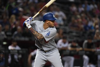 PHOENIX, AZ - SEPTEMBER 24:  Manny Machado #8 of the Los Angeles Dodgers gets ready in the batters box against the Arizona Diamondbacks at Chase Field on September 24, 2018 in Phoenix, Arizona.  (Photo by Norm Hall/Getty Images)