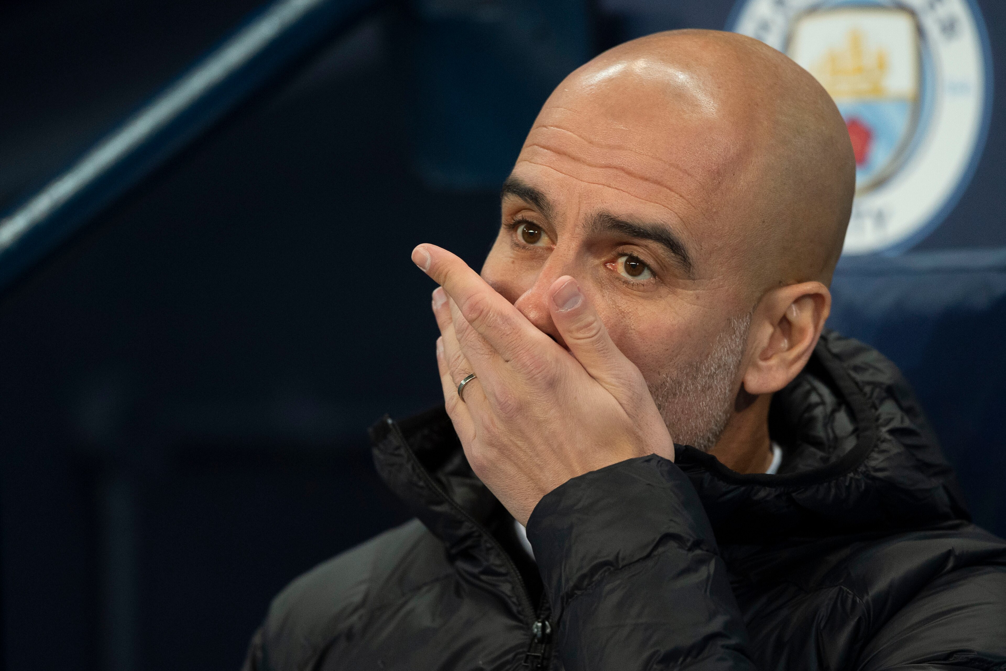 MANCHESTER, ENGLAND - DECEMBER 12: Joseph Guardiola of Manchester City looks on during the UEFA Champions League Group F match between Manchester City and TSG 1899 Hoffenheim at Etihad Stadium on December 12, 2018 in Manchester, United Kingdom. (Photo by 