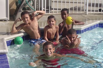 Through preschool and elementary school, Dre (top right) spent a lot of time hanging with Lonzo (front), LiAngelo (top left) and LaMelo (top middle) at their house.