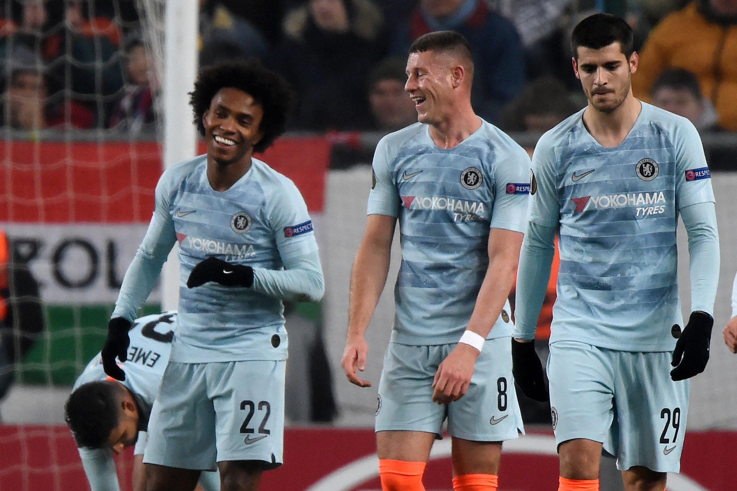 Chelsea's Brazilian midfielder Willian (L) is congratulated by teammates midfielder Ross Barkley and forward Álvaro Morata after scoring during the UEFA Europa League Group L football match between MOL Vidi FC and Chelsea on December 13, 2018 in Budapest.