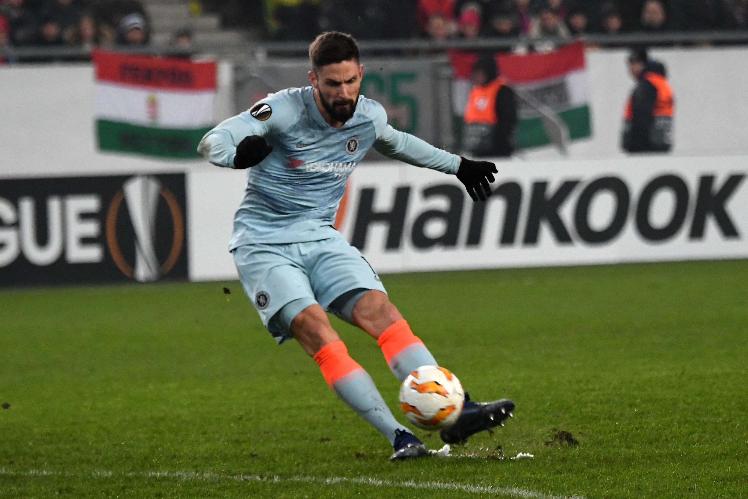 Chelsea's French forward Olivier Giroud kicks the ball before scoring a goal during the UEFA Europa League Group L football match between MOL Vidi FC and Chelsea on December 13, 2018 in Budapest. (Photo by ATTILA KISBENEDEK / AFP)        (Photo credit sho