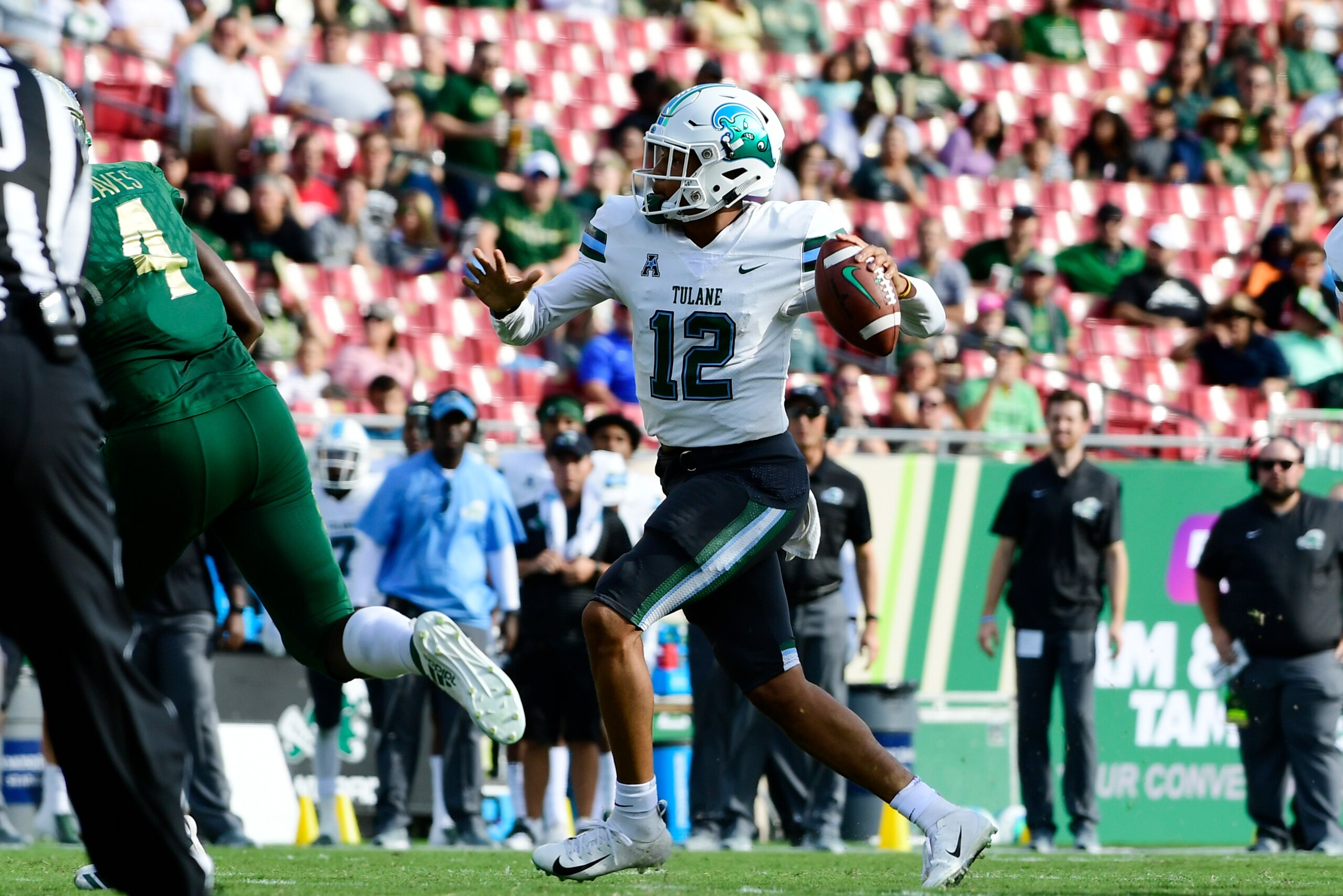 TAMPA, FLORIDA - NOVEMBER 03: Justin McMillan #12 of the Tulane Green Wave looks to pass during the second quarter against the South Florida Bulls at Raymond James Stadium on November 03, 2018 in Tampa, Florida. (Photo by Julio Aguilar/Getty Images) TAMPA, FLORIDA - NOVEMBER 03: Justin McMillan #12 of the Tulane Green Wave looks to pass during the second quarter against the South Florida Bulls at Raymond James Stadium on November 03, 2018 in Tampa, Florida. (Photo by Julio Aguilar/Getty Images)