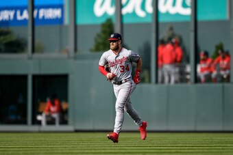 DENVER, CO - SEPTEMBER 30:  Bryce Harper #34 of the Washington Nationals jogs to return to the dugout after playing defense in the eighth inning of a game against the Colorado Rockies at Coors Field on September 30, 2018 in Denver, Colorado.  (Photo by Du