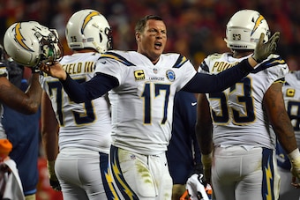 KANSAS CITY, MISSOURI - DECEMBER 13:  Quarterback Philip Rivers #17 of the Los Angeles Chargers protests a non-call after being hit in the helmet during the game against the Kansas City Chiefs at Arrowhead Stadium on December 13, 2018 in Kansas City, Miss